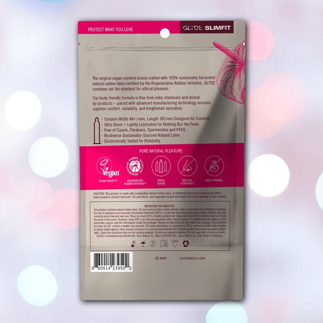 Back view of a Glyde SlimFit Small Size Condoms package showing vegan, cruelty-free, and ethical features, certifications, and product details. The gray box has pink accents and a subtle heart outline. Brand: Glyde.
