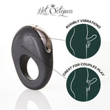 Introducing the Hot Octopuss Atom - Vibrating Cock Ring: a sophisticated black ring crafted by Hot Octopuss. This device boasts powerful, rumbly vibrations, making it ideal for both solo and couples play. Adorned with the brand's logo at the top, its design features distinctive callouts to ensure it stands out among cock rings.