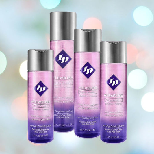 Four bottles of ID Lubricants' Pleasure Tingling Sensation Personal Lubricant, renowned for its enduring formula and tropical fragrance, are arranged against a softly blurred background. The pink bottles with gray caps emphasize their features in both English and Spanish. 1080