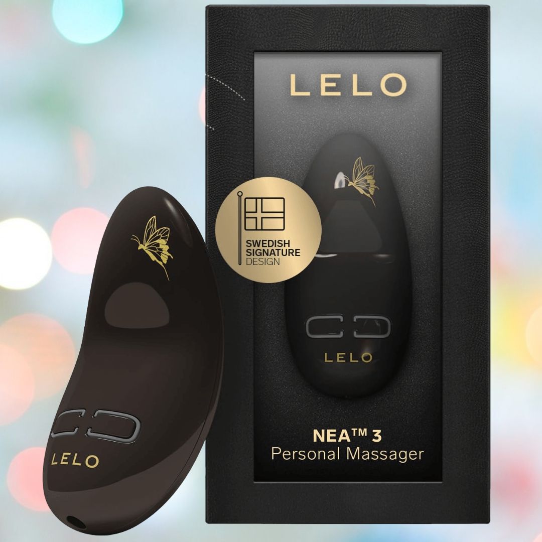 The LELO Nea 3 - Pitch Black, a sleek black handheld vibrator with gold fairy-like detailing, is displayed beside its black box packaging featuring a clear window showcasing the device and the LELO logo.