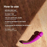 A LELO Smart Wand 2 Medium Personal Wand Massager by LELO in purple sits on a textured brown surface under sunlight. White text beside it gives instructions for charging, powering on, adjusting modes and intensity, and turning off.