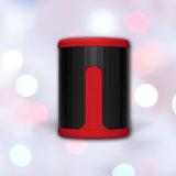 A sleek black cylindrical speaker with red accents and control buttons stands against a blurred bokeh backdrop, its modern design reminiscent of the LELO F2S Massager & Stroker: Dual-Ended Masturbator with App Control - Red by LELO.