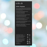 A black rectangular box for LELO KAYA Originals Purple, with white text for product details and specs, stands against a blurred background with colorful light spots.