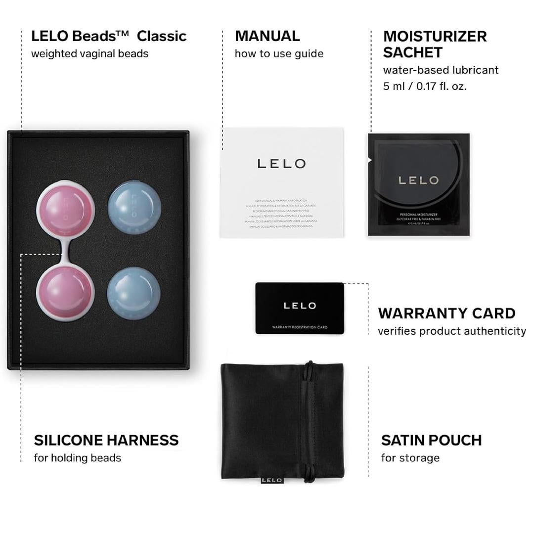 The LELO Luna Beads: Pelvic Floor Training Kegel Balls by Lelo come with two pink and two blue weighted beads, a black silicone harness, manual, moisturizer sachet, warranty card, and satin pouch—perfect for pelvic floor wellness.