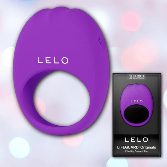 A purple Lelo LIFEGUARD Originals vibrating couples' ring by LELO, made of body-safe silicone, is pictured beside its black box showing the product image and "LELO LIFEGUARD Originals Vibrating Couples' Ring" text. 1080
