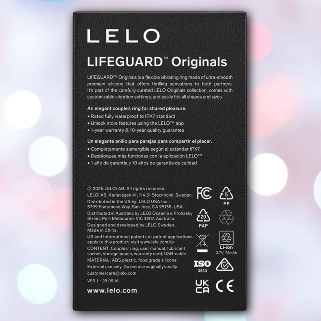 A black label for LELO’s Lelo LIFEGUARD Originals Purple showcases its waterproof, body-safe silicone design, warranty info, safety certifications, manufacturer details, and website—set against a blurred pastel backdrop with circular light spots.