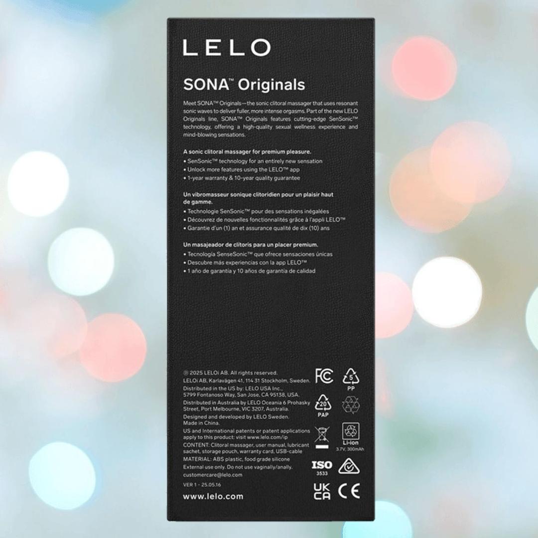 A purple LELO SONA Originals product box with white text displaying features and company info is set against a blurred, colorful background with circular light spots.