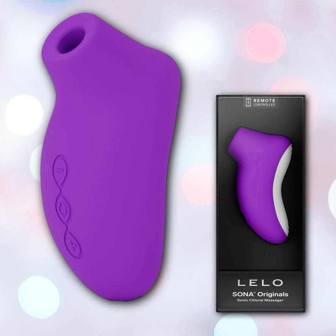 The LELO SONA Originals Purple, a sleek silicone clitoral stimulator with three buttons, is shown next to its black box featuring the product image and LELO branding.