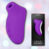 The LELO SONA Originals Purple, a sleek silicone clitoral stimulator with three buttons, is shown next to its black box featuring the product image and LELO branding.