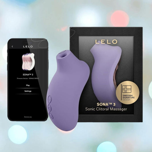 The LELO Sona 3 - Violet Dusk, featuring advanced SenSonic technology, is displayed beside its black packaging and a smartphone showing the app. The softly blurred pastel background enhances the scene. 1080