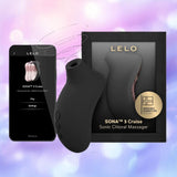 A LELO Sona 3 Cruise - Black clitoral massager by LELO is pictured next to its packaging and a smartphone showing the control app, all set against a blurred pink and purple background.