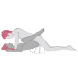 Illustration of two people having sex; one is lying on their back with the Liberator Bonbon Microvelvet - Teal from Liberator under their hips while the other partner is on top, positioned between their legs.