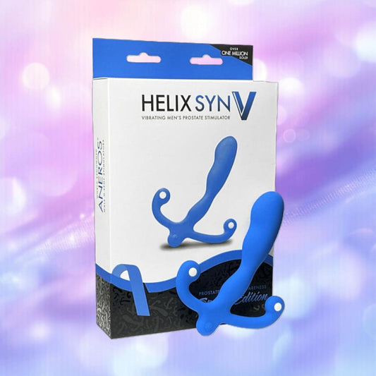 The Aneros Helix Syn V Special Edition Blue prostate stimulator and packaging are shown against a blurred pink and purple background. Its ergonomic curves and flexible arms deliver targeted prostate stimulation for enhanced pleasure. 1080