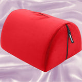 The Liberator Bonbon Microvelvet - Flame, a red dome-shaped cushion with zipper and handle, is shown on pale lavender satin—an ideal and stylish sex toy mount by Liberator for hands-free solo pleasure.