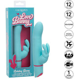 The CalExotics Love Bunny Beaded “G” Bunny, a blue silicone rabbit vibrator, is shown beside its packaging. Icons highlight 12 functions, dual motors, waterproofing, USB charging, travel lock, silicone build, and a 1-year warranty.