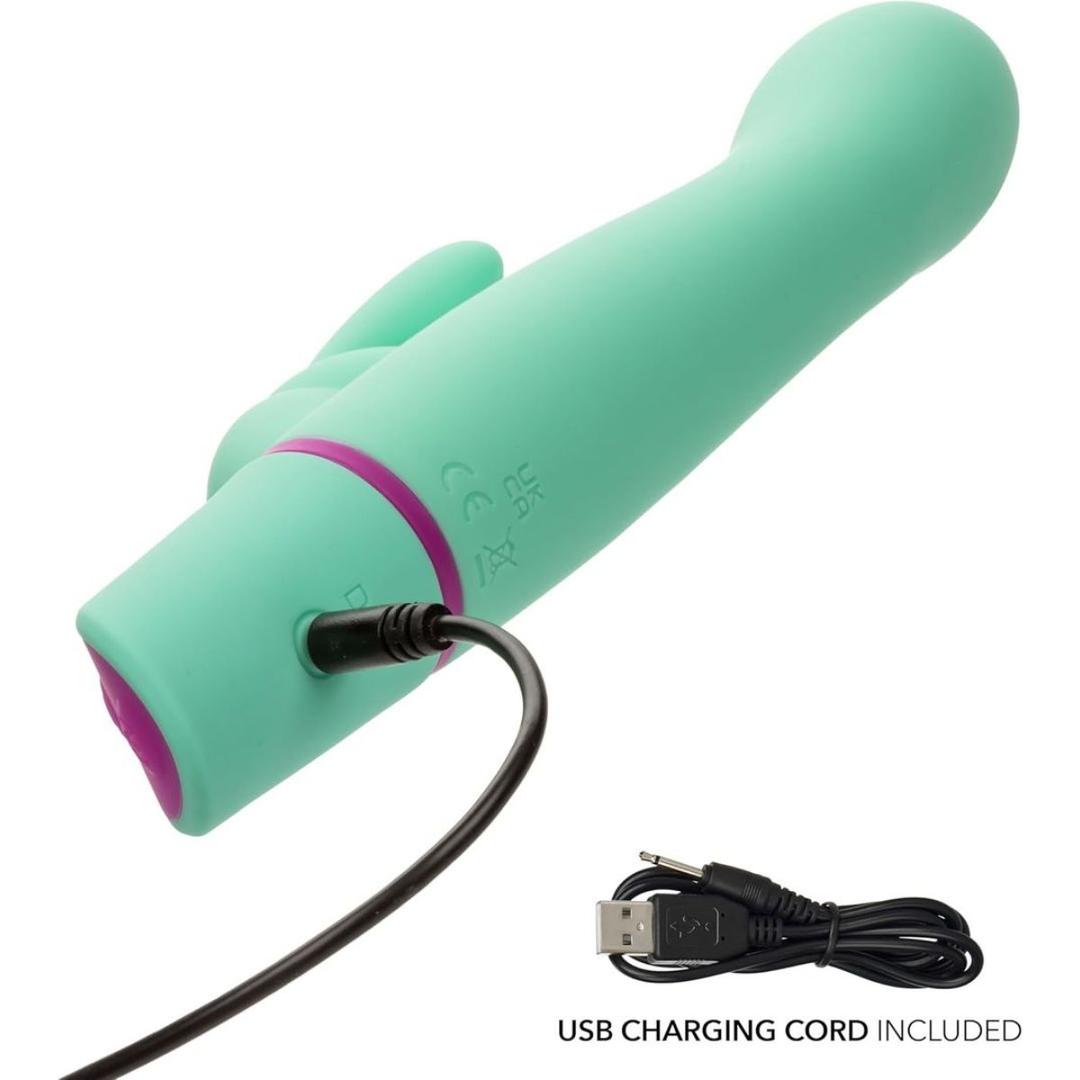 The Love Bunny Rockin’ “G” Bunny by CalExotics, a teal silicone vibrator with a curved tip, is pictured alongside its USB charging cord and plug, showing that the charging cable is included.