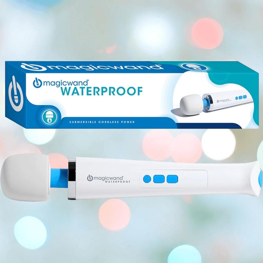 The Magic Wand Waterproof Massager by Magic Wand is displayed before its blue and white branded packaging. Featuring blue buttons and a white handle, it is recognized for delivering deep vibrations.
