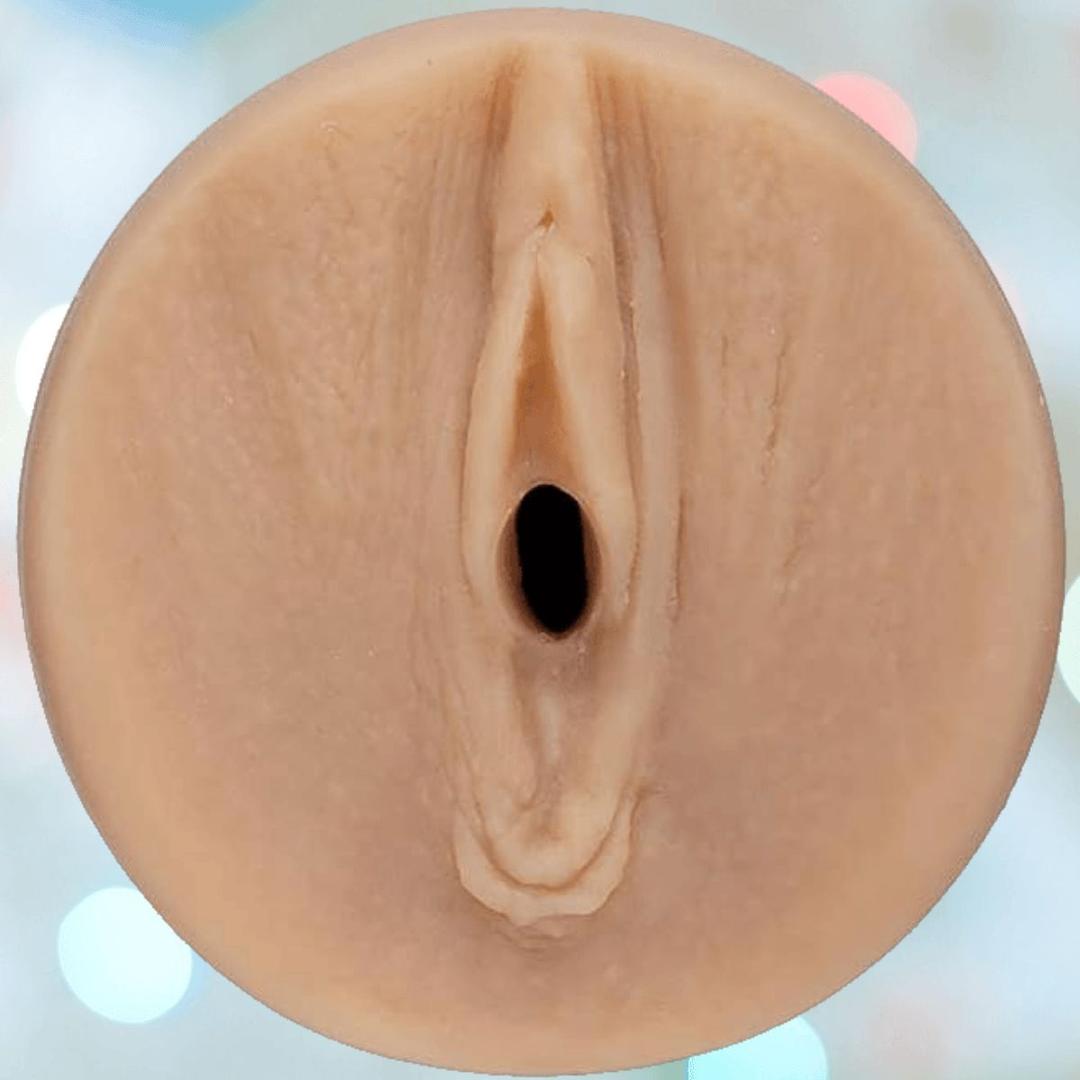 A close-up of the inviting ULTRASKYN texture inside the Main Squeeze Endurance Trainer Stroker Pussy - Vanilla by Doc Johnson.