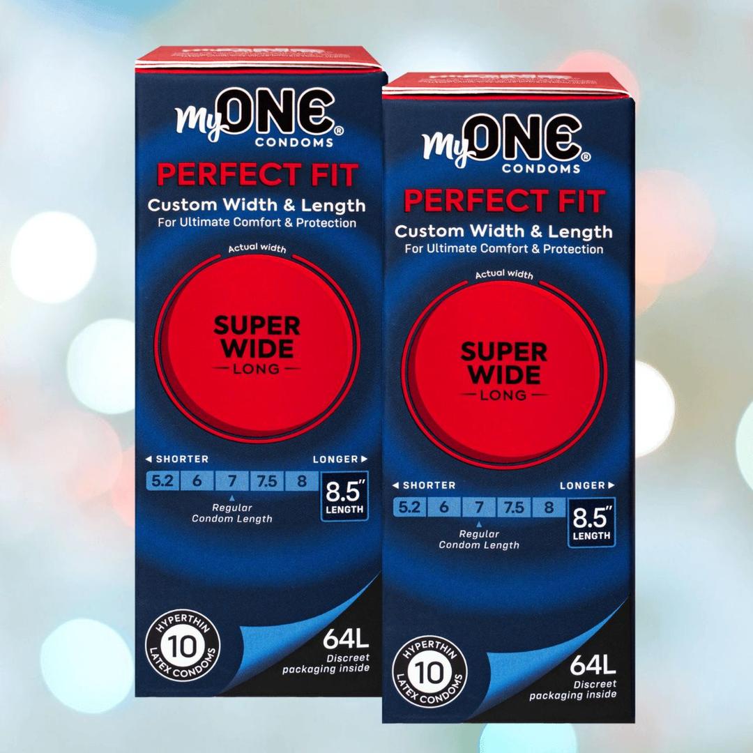 Two boxes of MyONE Super Wide & Long 64L - 8.5" Long condoms are shown, emphasizing custom width and length. The packaging highlights size 64L (8.5" long) by MyONE, with a softly blurred background featuring subtle light spots.