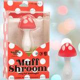 The Naughty Bits Muff Shroom Playful Massager by CalExotics resembles a red and white mushroom and is shown beside its polka-dot "Muff Shroom" packaging.