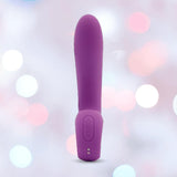 The Nu Sensuelle Nubii Raine Tapping Vibrator with Warming and Turbo Boost by NOVEL CREATIONS USA stands upright, showcasing its purple hue, rounded tip, and base control buttons against a soft pastel bokeh background.