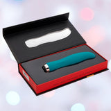 The Nu Sensuelle Velvet Touch Bella Vibrator with Turbo Boost by NOVEL CREATIONS USA in emerald green is made from body-safe silicone and comes in a black and red gift box reading "Melt into the magic of pleasure.