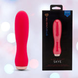 A hot pink Nu Sensuelle Velvet Touch Skye Vibrator with Turbo Boost by NOVEL CREATIONS USA stands upright beside its black packaging, which shows the product and highlights 20 vibration functions and powerful, velvet-touch sensations.