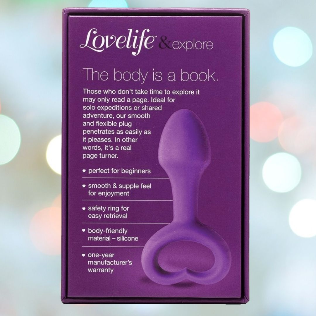 A purple OhMiBod Lovelife Explore Butt Plug features a smooth, flexible silicone body, heart-shaped safety base, beginner-friendly design, and comes with a one-year warranty—perfect for solo play or shared fun.