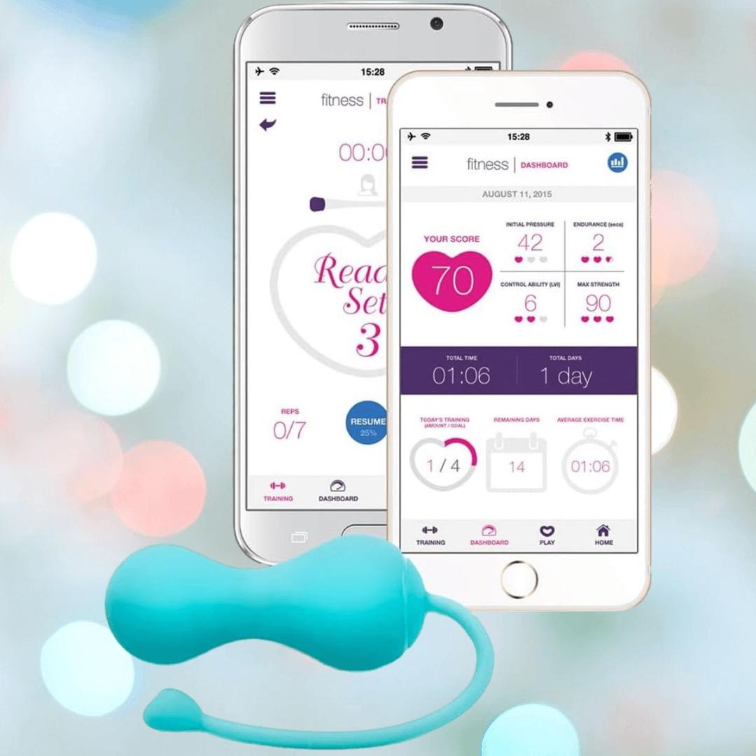The OhMiBod Lovelife Krush Smart Kegel Fitness in Turquoise appears in front of two smartphones showing fitness stats and scores on their apps, with a softly blurred background of pastel lights. Brand: OhMiBod.