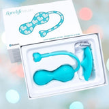 An open box displays the OhMiBod Lovelife Krush Smart Kegel Fitness in turquoise, with floral-patterned packaging highlighting its fitness benefits and Bluetooth compatibility.
