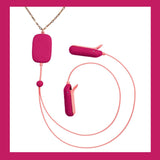 The OhMiBod Sphinx Bluetooth App-controlled Nipple Clamps in Raspberry by OhMiBod feature a textured pink surface, gold chain, and earbud-like ends connected by a pink cord, offering seamless Bluetooth app control. Displayed on white with a pink border.