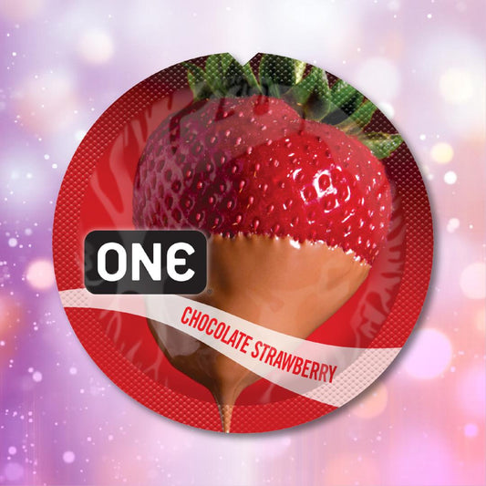 A round label for ONE Chocolate Strawberry Flavored Condoms 🍓 shows a chocolate-dipped strawberry and the word "ONE" in bold; "Chocolate Strawberry" appears diagonally below on a glowing red background, hinting at its vegan formula. 1080
