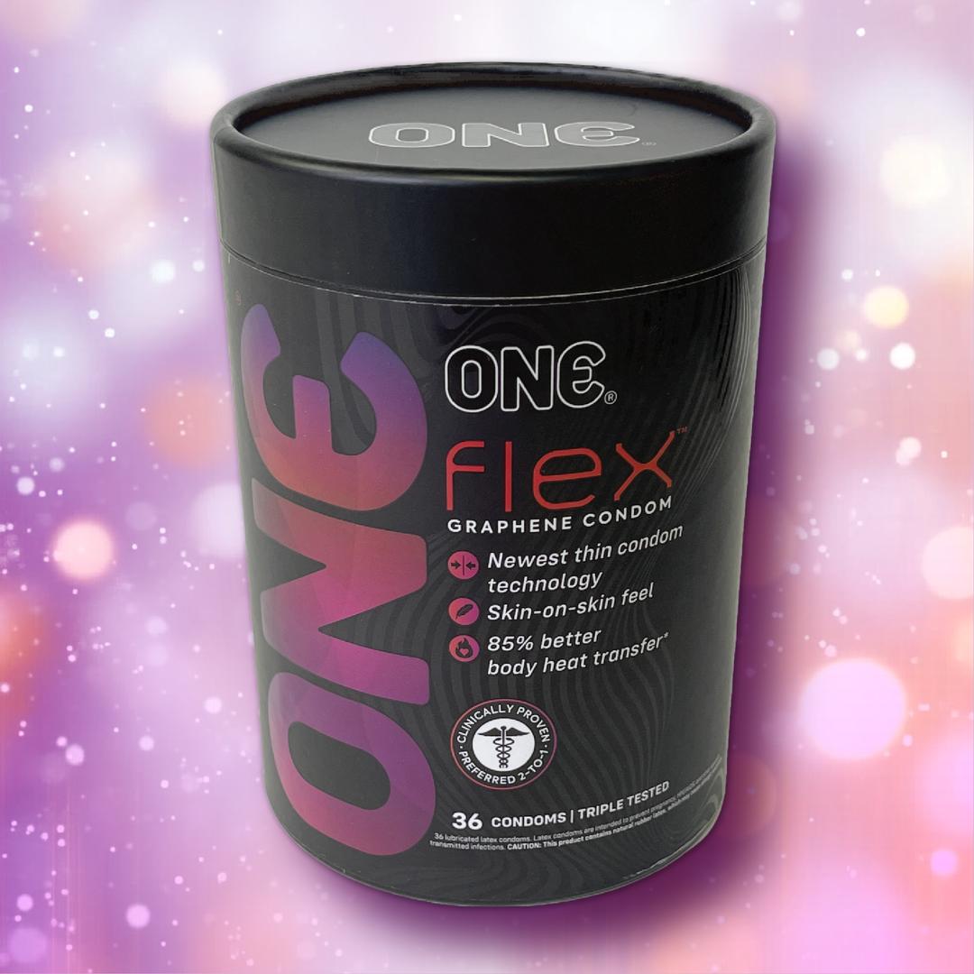 A cylindrical container of ONE Flex Graphene Ultra-Thin Condoms by ONE is shown against a pink and purple bokeh background. The label highlights ultra-thin design, skin-on-skin sensation, and body heat transfer. Contains 36 premium condoms.