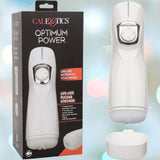 A white CalExotics Optimum Power Lifelike Pulsar Stroker is displayed beside its box, showcasing its vibration, suction modes, and USB rechargeable features. The masturbator’s cap is positioned in front.