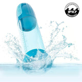 A blue CalExotics Optimum Series Rechargeable Advanced Waterproof Pump splashes into water, droplets flying. In the top right, a “WATERPROOF IPX7 SUBMERSIBLE” label highlights its robust performance in any wet environment.