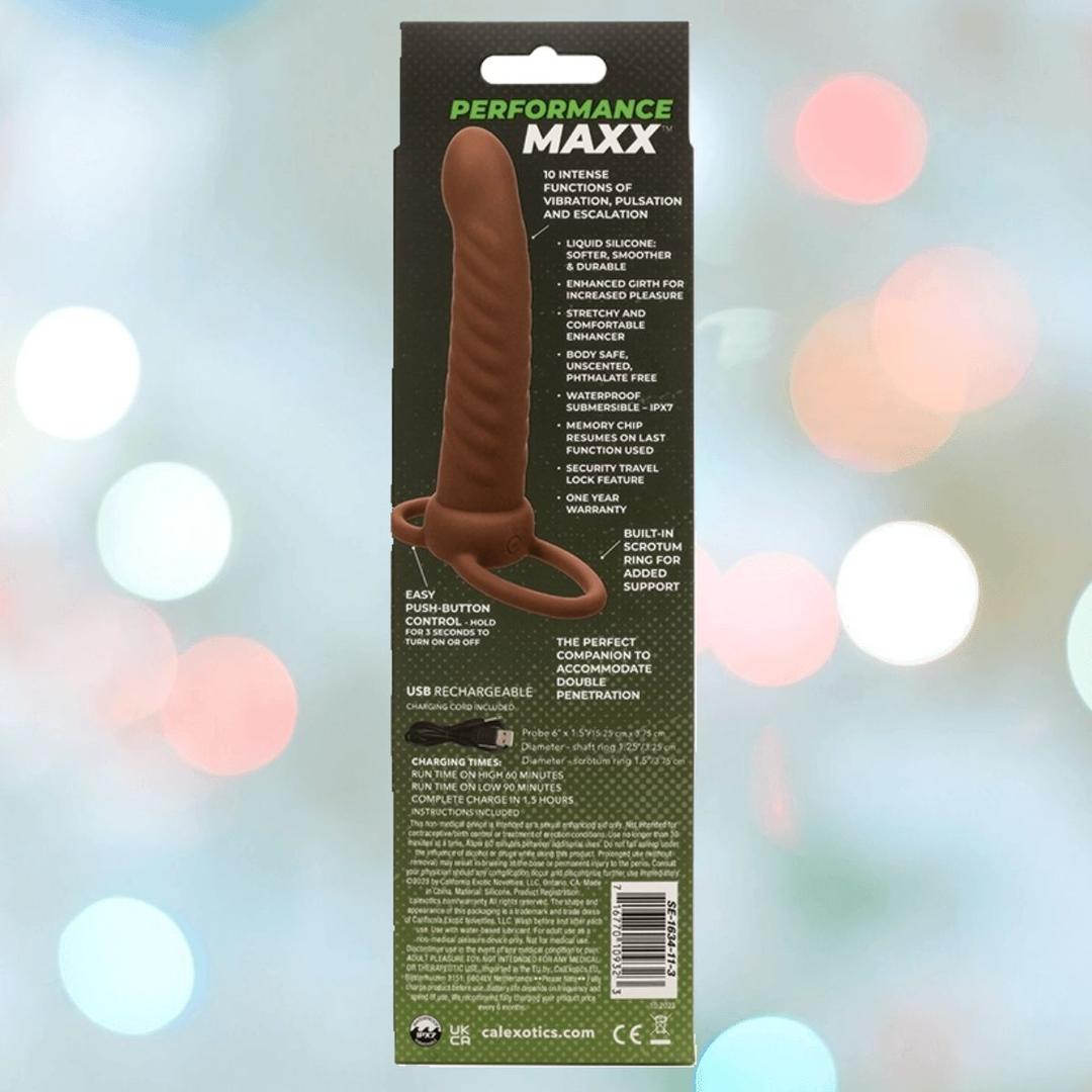 A brown, ribbed USB-rechargeable adult toy by CalExotics, the "Performance Maxx Rechargeable Ribbed Dual Penetrator," made of body-safe silicone and packaged with product details, features, and instructions on the back.