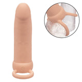 The CalExotics Performance Maxx Rechargeable Thick Dual Penetrator - Ivory is a realistic, flesh-toned silicone sleeve with a base ring and on/off button, designed for double penetration and enhanced sensations.