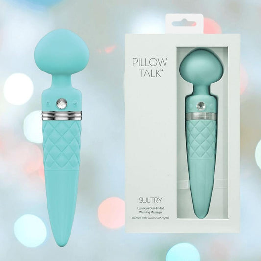 The BMS Pillow Talk Sultry Wand Massager in teal, featuring a quilted grip and silver accent, is displayed beside its white and clear packaging. Powerful vibrations await against a softly blurred pastel background. 1080