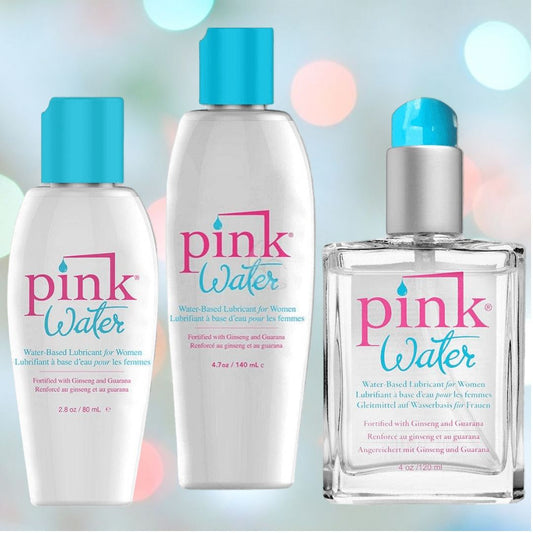 Three bottles of "Pink Water" water-based personal lubricant by Pink are displayed against a light background. The bottles come in various sizes, featuring a clear design with blue caps and pink branding. The text on the bottles highlights that the product is paraben-free and designed for women, containing ginseng and guarana for long-lasting comfort. 1080