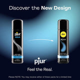 Image displaying two bottles of Pjur AQUA Water-Based Lubricant | 100ml (3.4oz), highlighting a sleek and modern design. Featuring the text "Discover the New Design" and "Feel the Real," this long-lasting, non-irritating formula from Pjur ensures comfort. Note: You may receive either of these pack designs for a limited time.