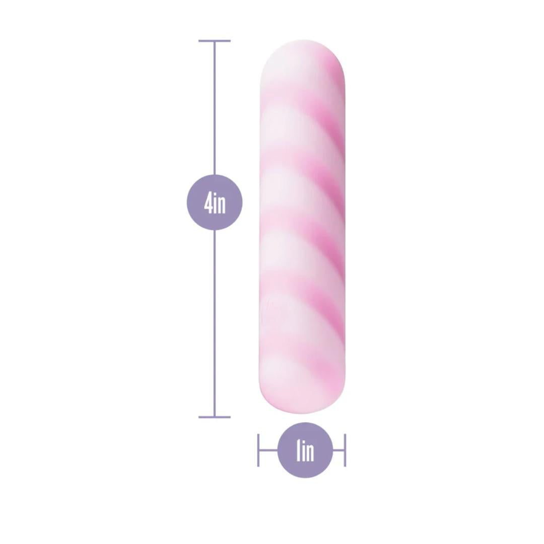 The Play With Me Sugar Crush - Pink by Blush Novelties is a 4" x 1" cylindrical clitoral vibrator with pink and white stripes, made from body-safe silicone and shown with labeled arrows indicating its dimensions.