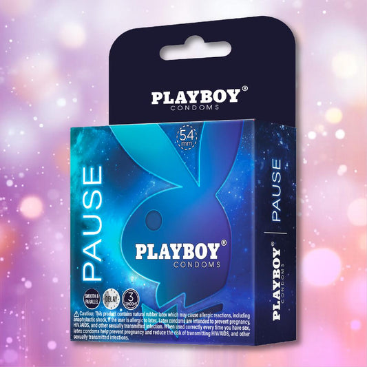 A box of Playboy Condoms - Pause Play Longer (3 premium lubricated condoms, 54mm) with the iconic bunny logo and blue design is shown against a pink and purple bokeh background. 1080