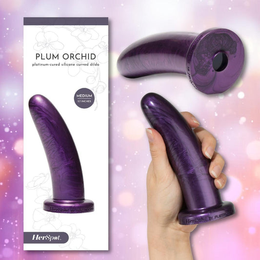 A hand holds the Fleshlight HerSpot Plum Orchid Dildo, a medium 5.7-inch platinum-cured silicone toy. Shown from two angles alongside its packaging, labeled with the Fleshlight brand and product name. 1080