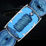 A metallic UFO hovers in a dark sky behind a floating blue geometric object, its form mirroring the dual-entry design of the Fleshlight Quickshot Alien Blue Male Masturbator: Mouth & Butt by Fleshlight, with swirling blue patterns on either side.