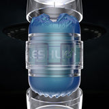 A transparent case reveals the blue, textured sleeve of the Fleshlight Quickshot Alien Blue Male Masturbator: Mouth & Butt by Fleshlight, featuring a dual-entry design for travel-friendly pleasure.