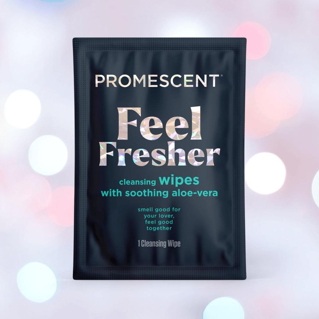 A black packet labeled "Promescent Before and After Wipes (40 Count)" by Promescent is shown, highlighting these biodegradable intimate wipes that promote freshness, set against a softly blurred pastel background.