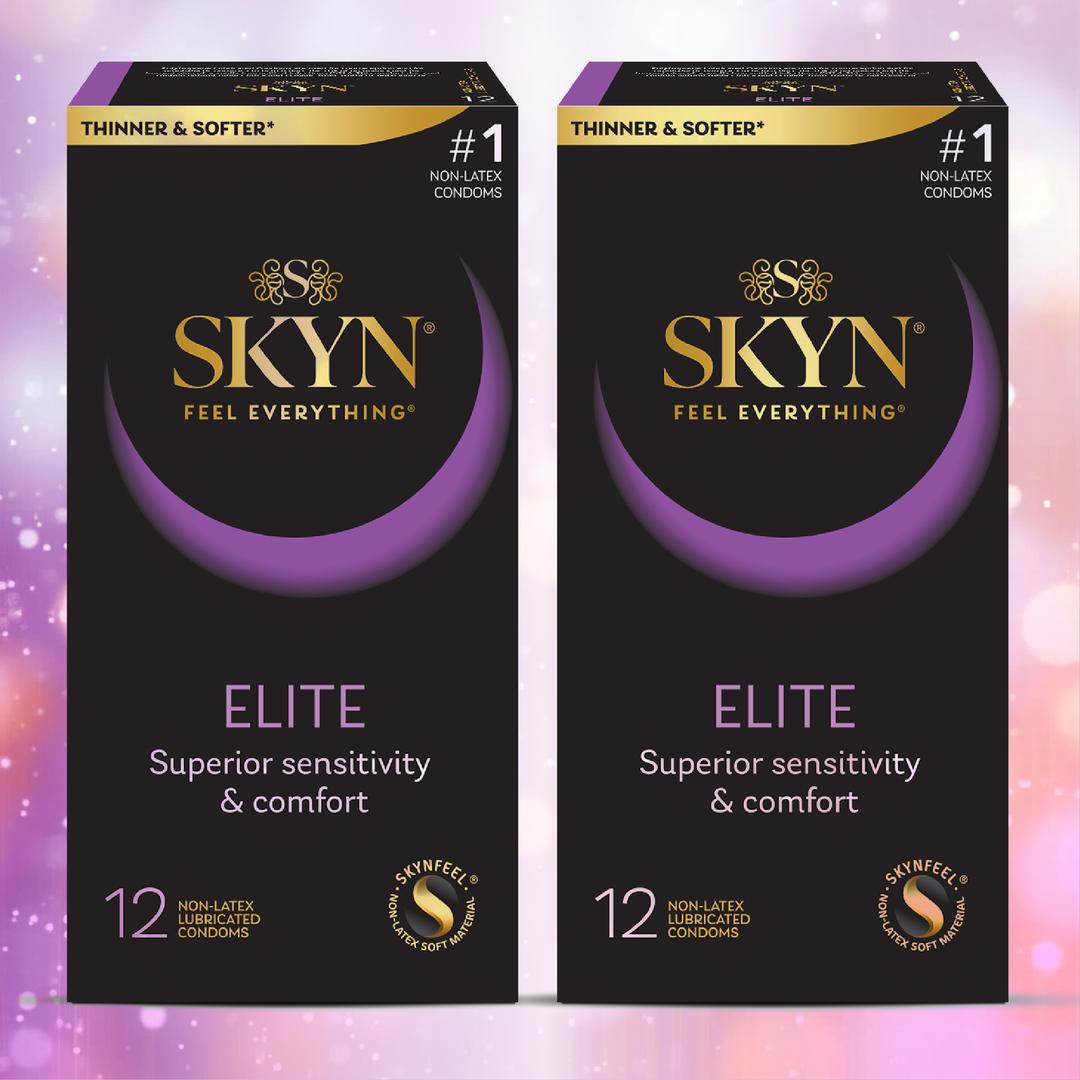 Two boxes of LifeStyles SKYN Elite Condoms (Latex-Free) are shown side by side on a pink and white bokeh background. Each box contains 12 ultra-thin condoms, featuring "Superior sensitivity & comfort" and "Thinner & Softer.