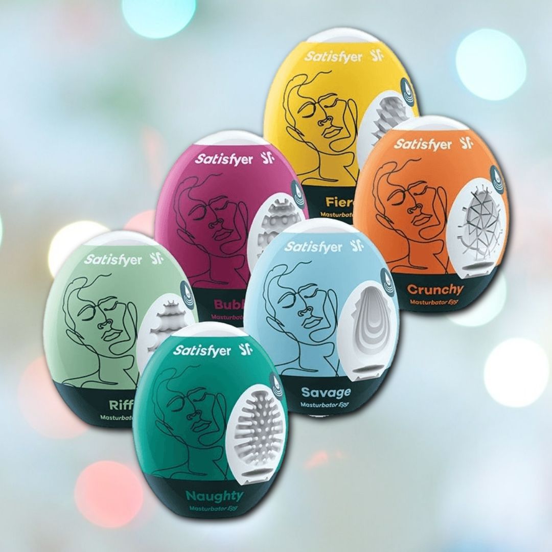 The six-pack of Satisfyer Masturbator Stroker Eggs offers a unique sensation with each egg featuring distinct colors and textures labeled "Riffle," "Savage," "Crunchy," "Naughty," "Bubbly," and "Fierce" for unmatched portability and pleasure.