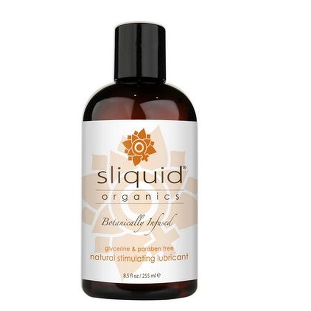 A brown plastic bottle labeled “Sliquid Organics Sensation Aloe-Based Warming Lube” by Sliquid, a botanically infused natural lubricant that is aloe-based, warming, and free of glycerine and parabens, featuring an orange floral design on the label.
