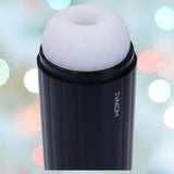 The Svakom Sam Neo 2 Pro Heating, Sucking & Vibrating Masturbator, featuring a black cylindrical design with a white textured top, exudes sophistication. Set against a blurred background with soft circular lights, it promises customizable pleasure and realistic warmth.